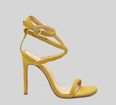 Yellow braided-strap stiletto sandal with ankle buckle and open toe.