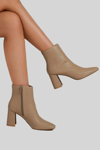Beige leather ankle boots with almond toe, block heel and side zipper