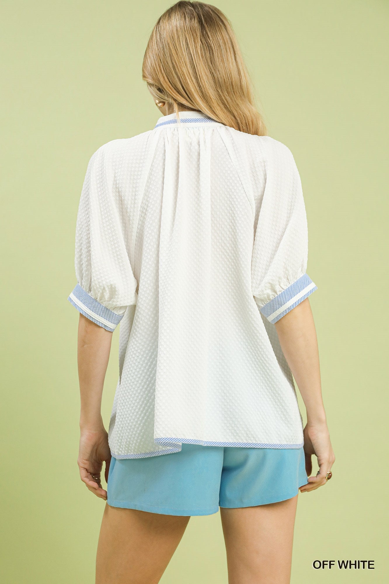 Cedar & Moore Umgee textured jacquard top with blue contrast trim, back view.