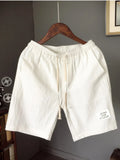 Men's plus size drawstring shorts, white with elastic waistband and drawstring