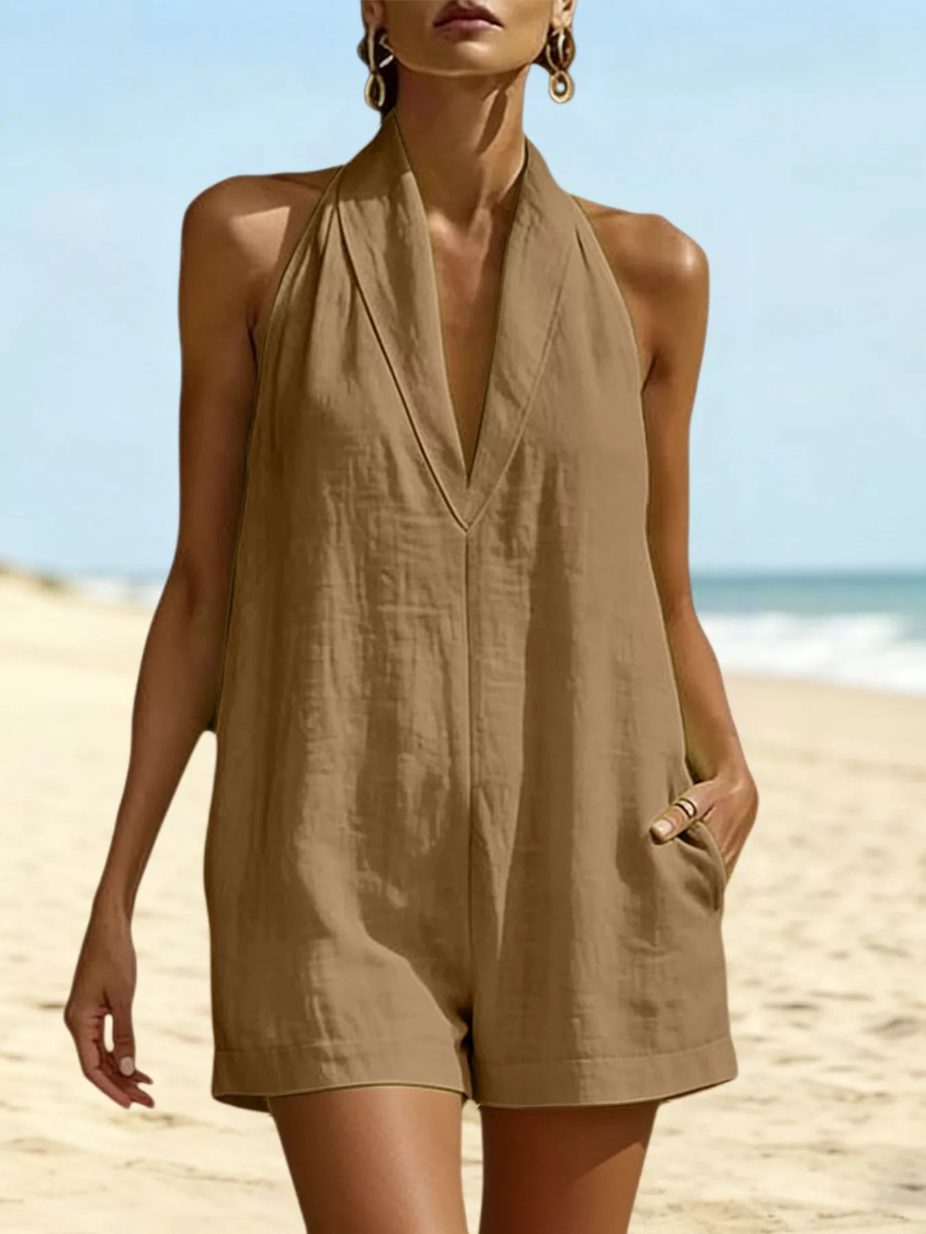 Khaki halter-neck romper with V neckline and front pockets, short legs