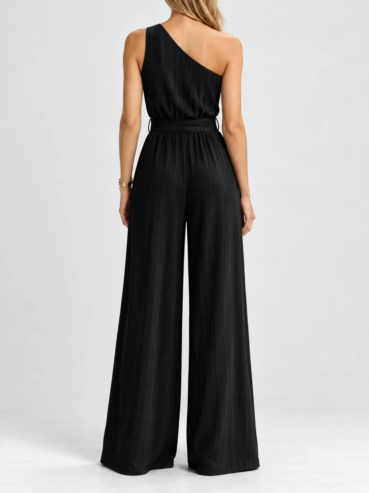 One-shoulder pleated wide-leg jumpsuit, black back view with self-tie waist