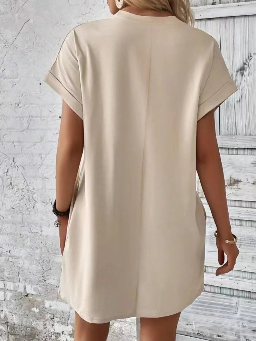 Cream round-neck short-sleeve dress, back view with straight relaxed cut