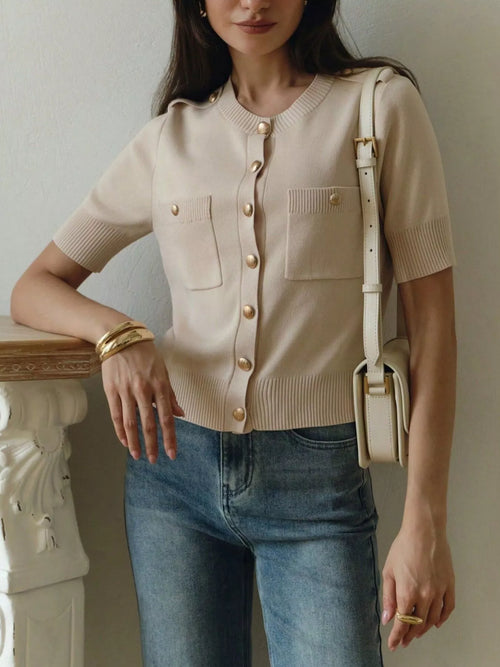 Beige short-sleeve cardigan knit with gold-tone buttons and patch pockets