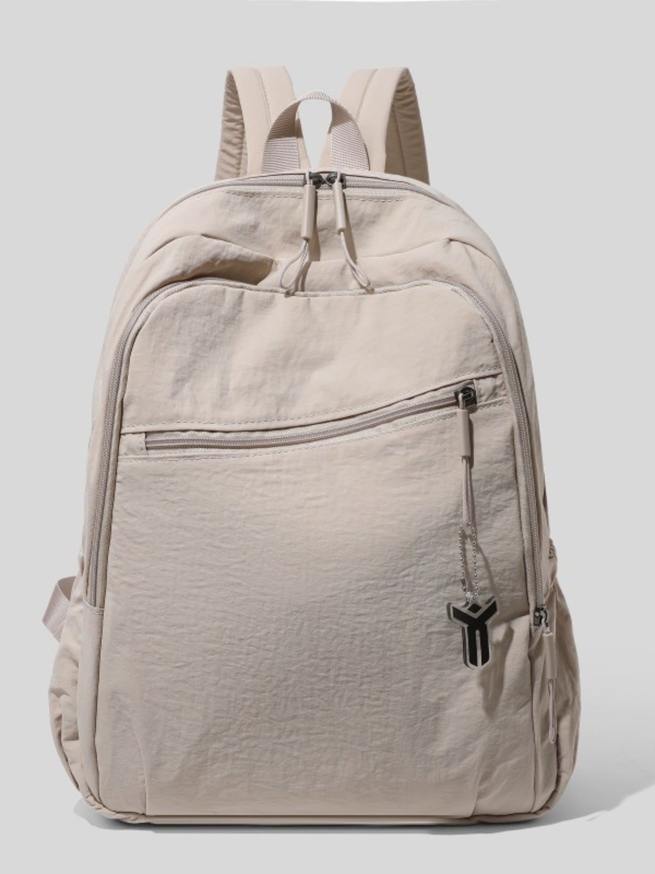 Cedar & Moore Trendsi lightweight beige nylon backpack with front zipper pocket