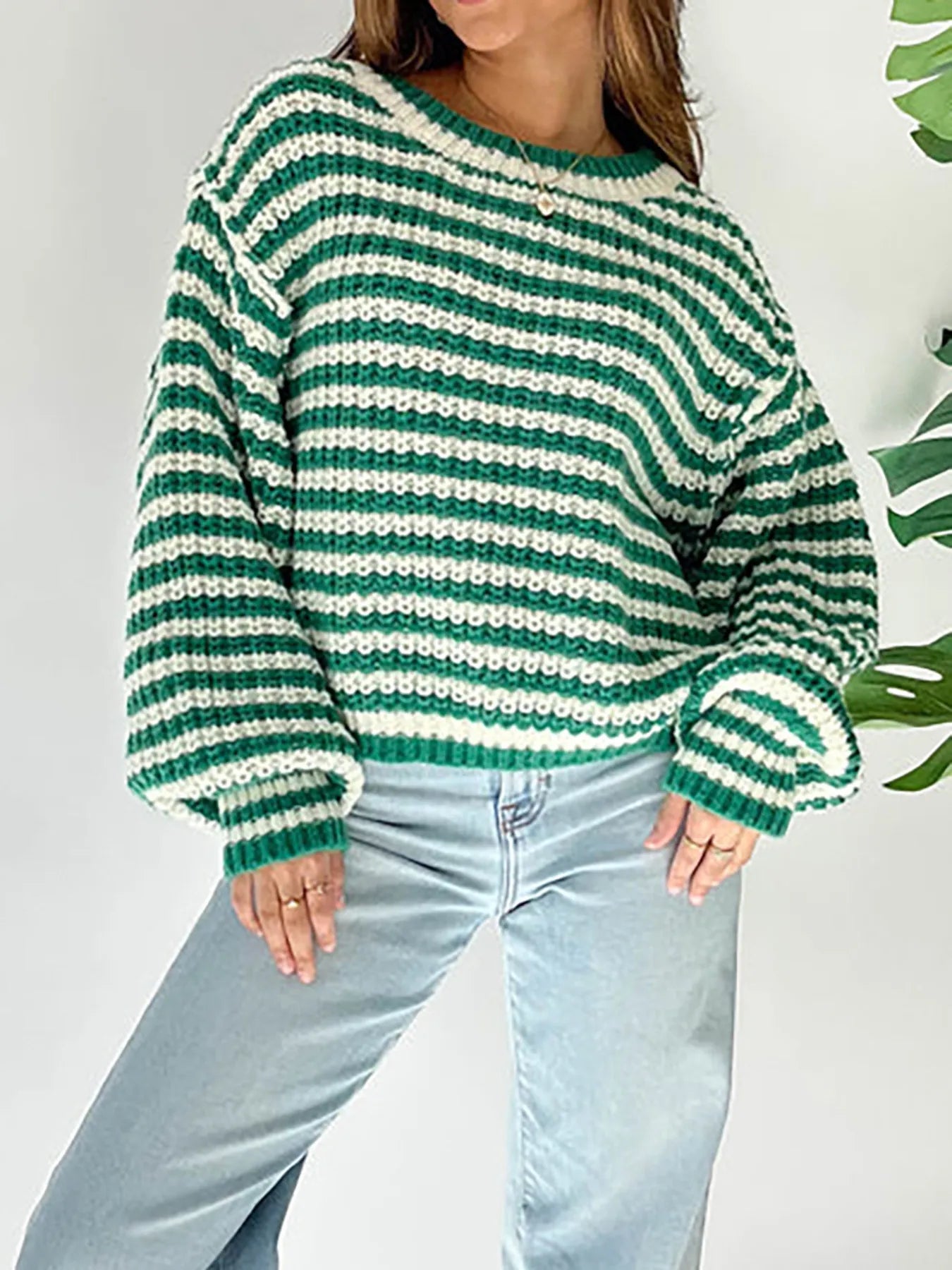 Green-and-white striped oversized drop-shoulder sweater, ribbed crew neckline