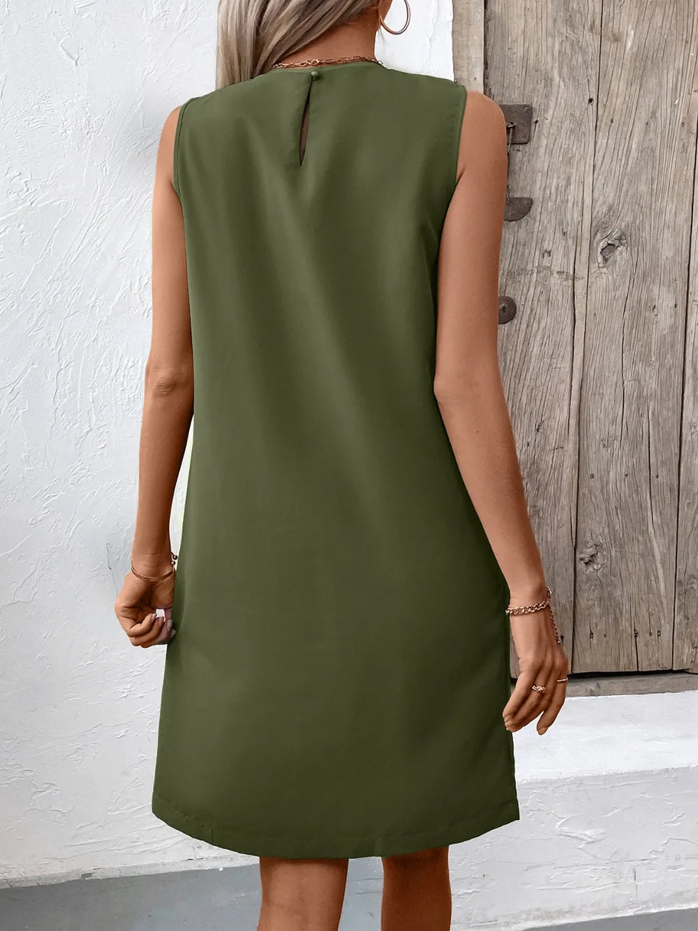 Ivy Lane pocketed olive green round-neck sleeveless mini dress with back keyhole.