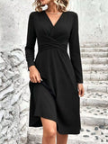 Black V-neck long-sleeve midi dress with ruched crisscross waist and asymmetrical hem