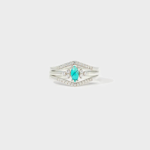 Silver V-shape turquoise teardrop ring with double row zircon accents