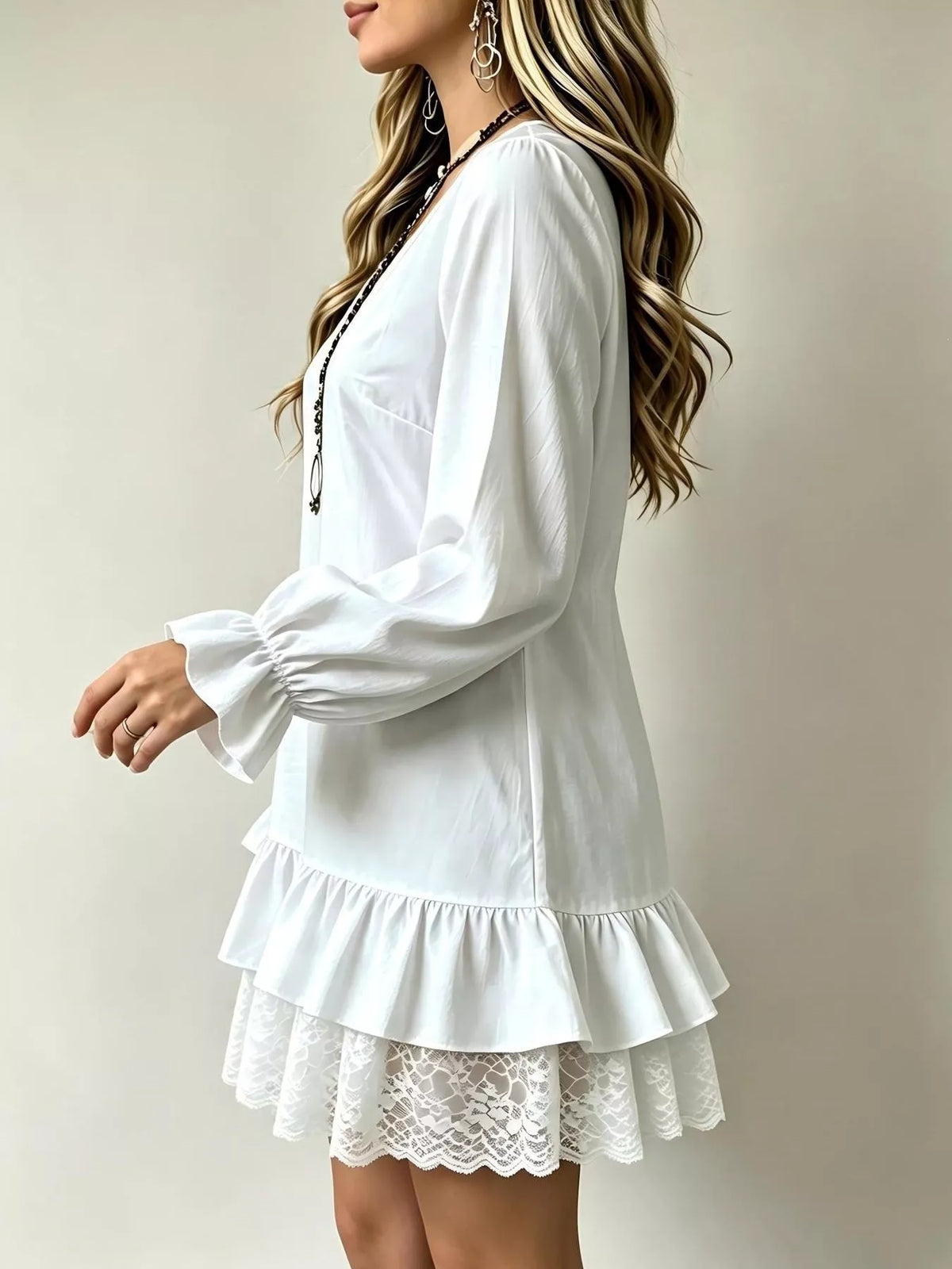 White V-neck long-sleeve mini dress with lace-trim ruffle hem and puff cuffs