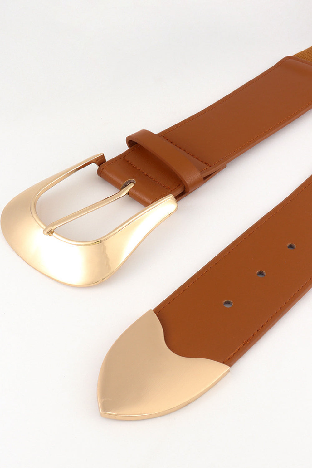 Caramel vegan belt with gold oval buckle and smooth strap edge