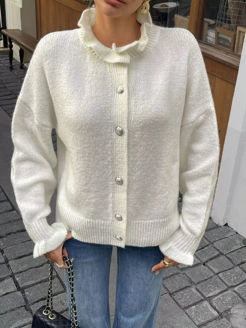 Cream button-front cardigan with textured knit and long sleeves
