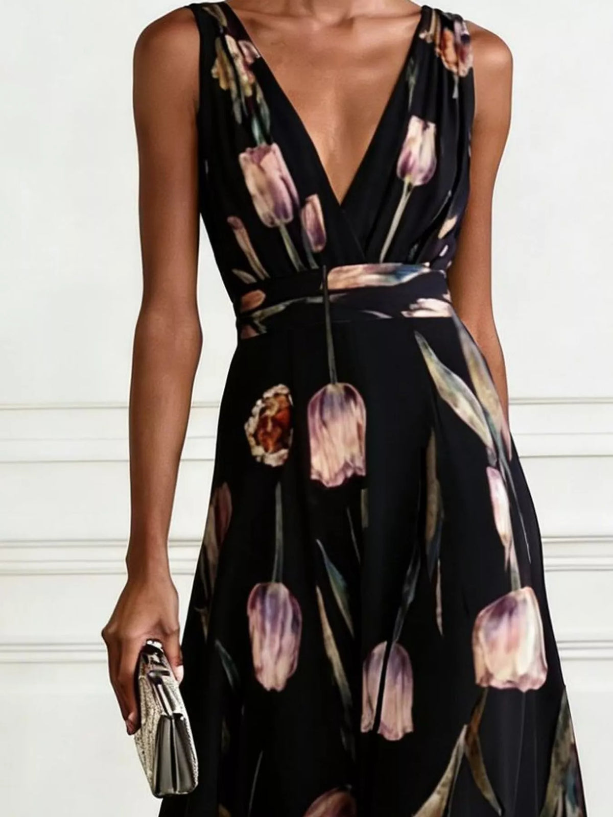 Black sleeveless floral print ruched maxi dress with V-neck and tie waist detail