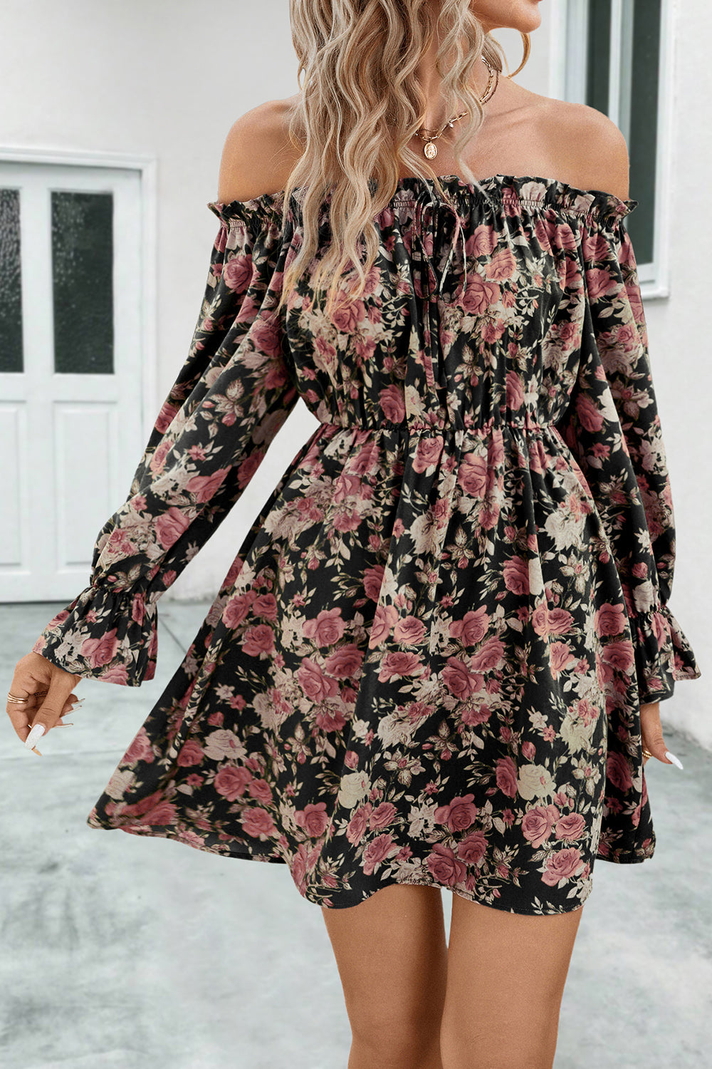 Black floral off-shoulder dress with gathered waist and long flounce sleeves