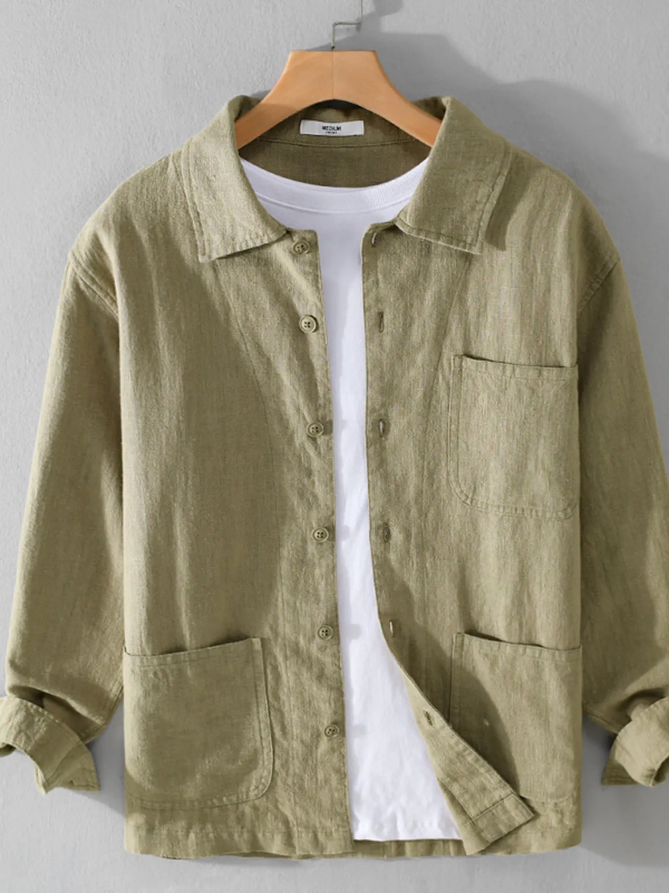 Khaki button-up shirt with chest pocket, button front, and long sleeves.