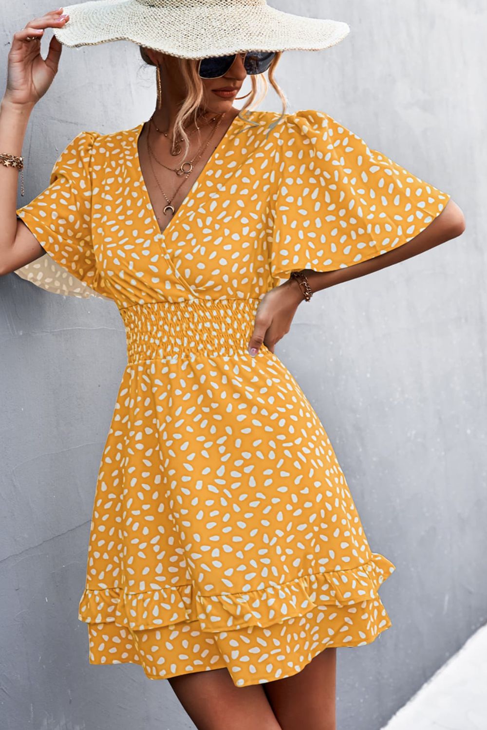 Mustard printed surplice dress with smocked waist and tiered layered skirt