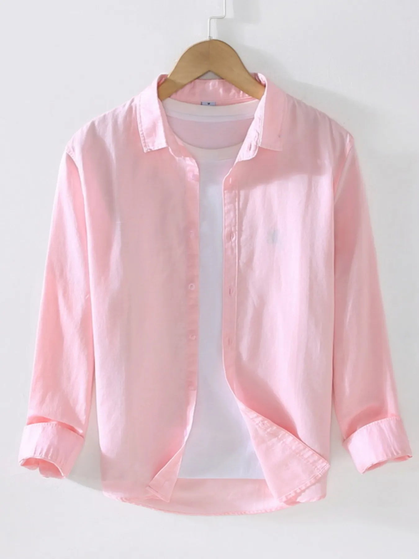 Pink short-sleeve button-up shirt with point collar and front button placket