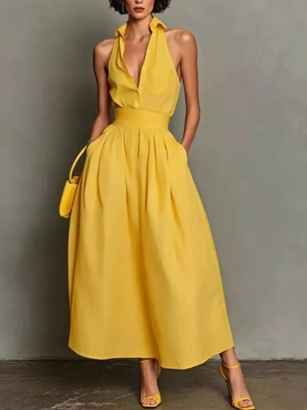 Yellow sleeveless collared A-line midi dress with front pocket and button placket