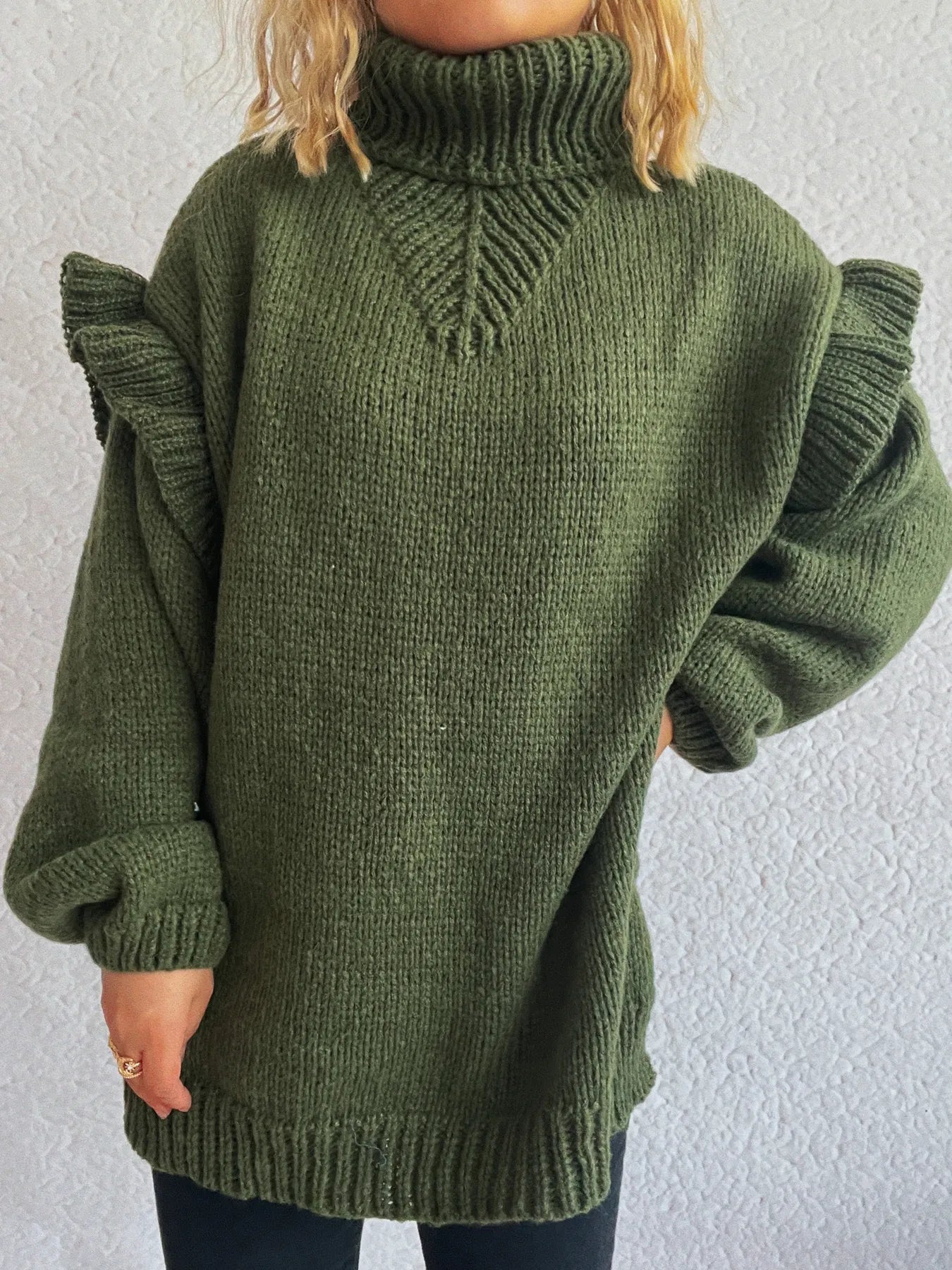Olive green ruffled turtleneck long-sleeve sweater with ribbed neckline and cuffs