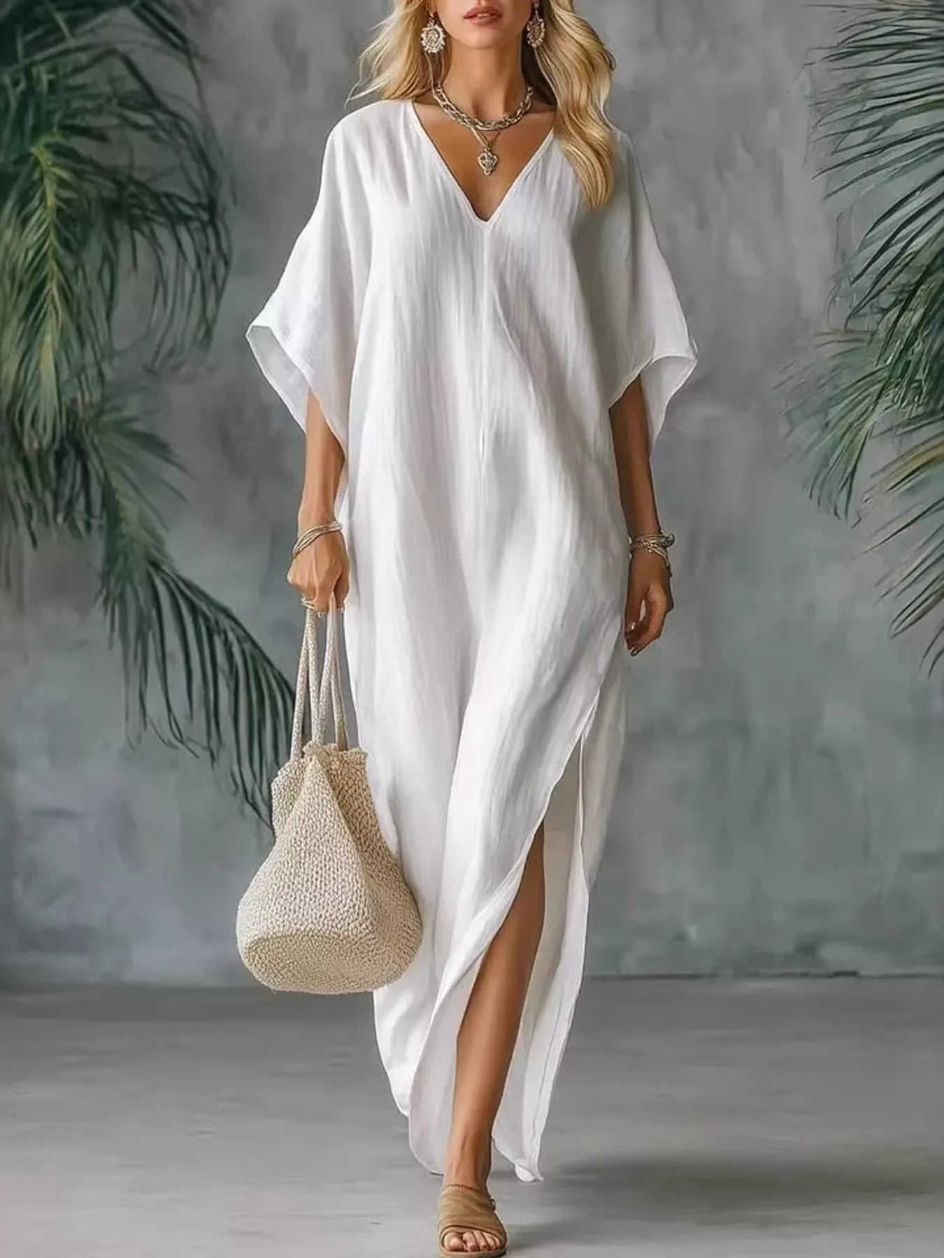 White V-neck maxi dress with short sleeves and side slits, loose draped fit
