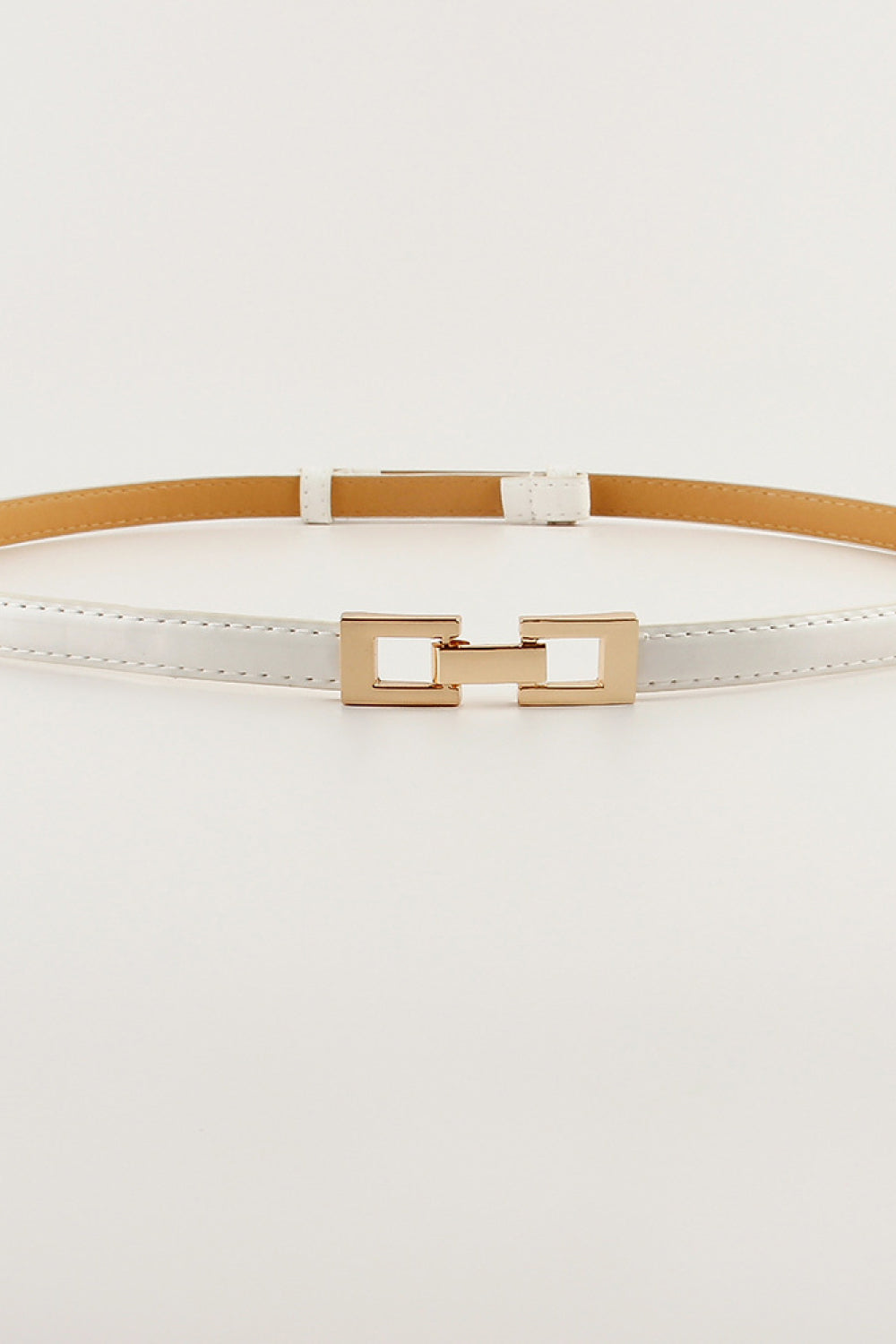 Light-beige slim belt with tan top and gold-tone square buckle