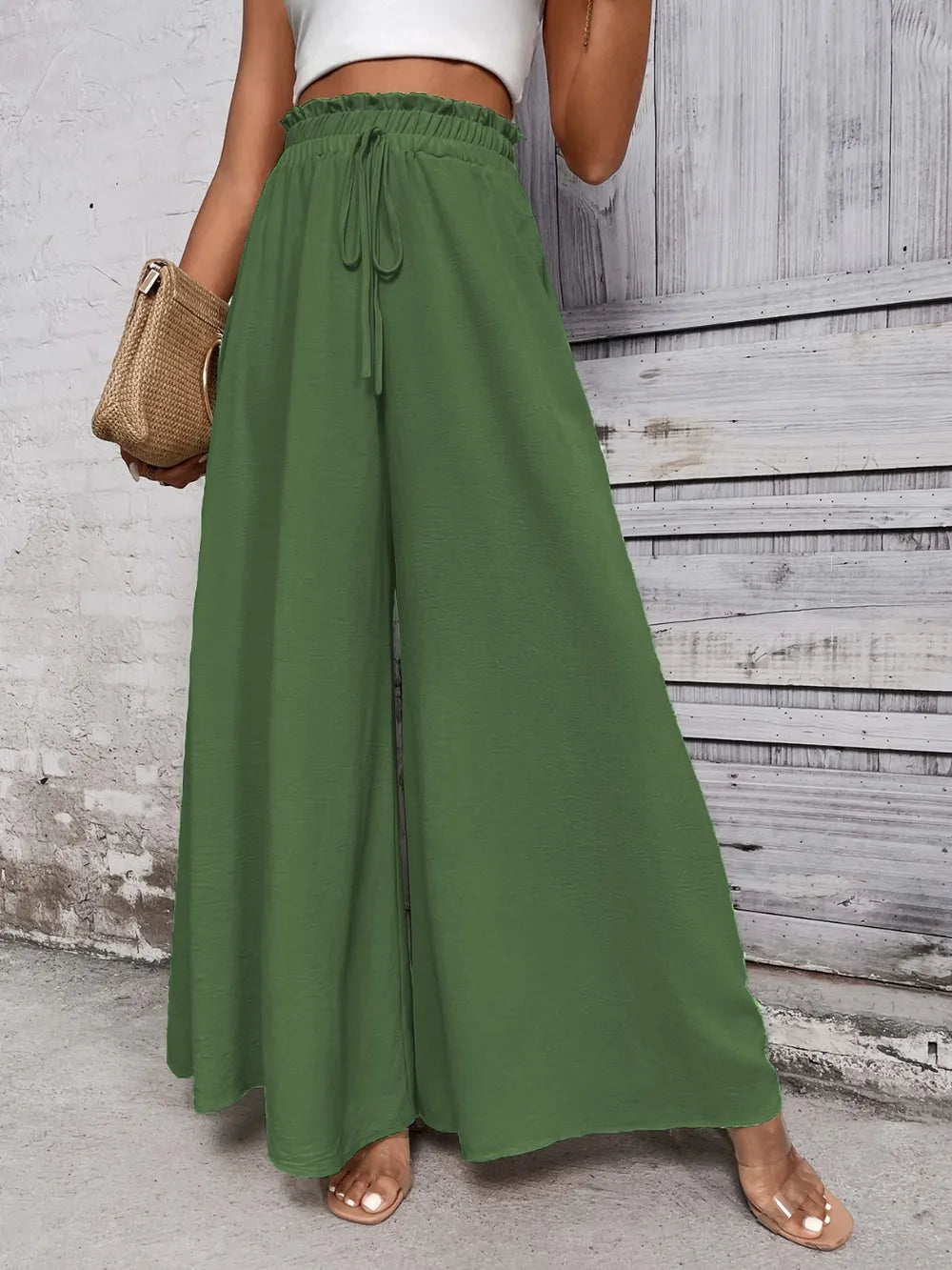High-waist wide-leg pants in olive green with drawstring tie and loose flowing legs