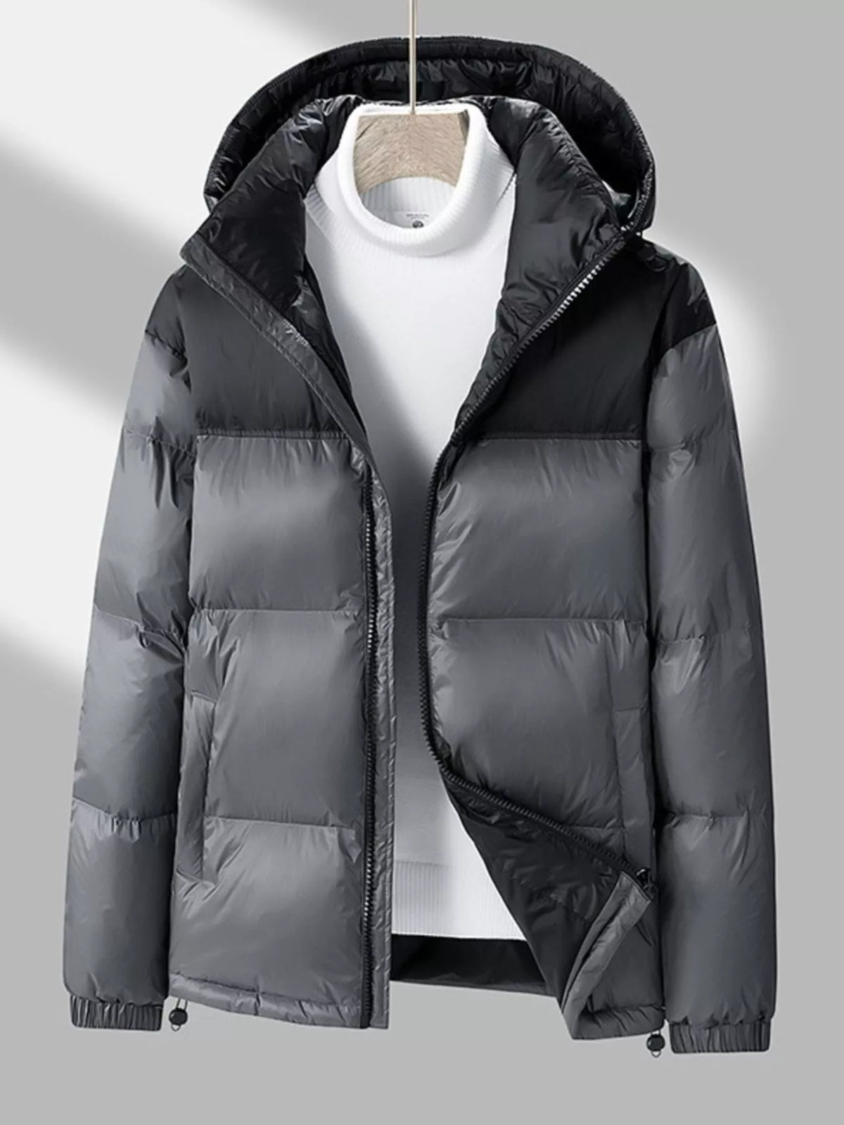 Black lightweight hooded puffer coat, front zip, quilted insulation, drawcord hem