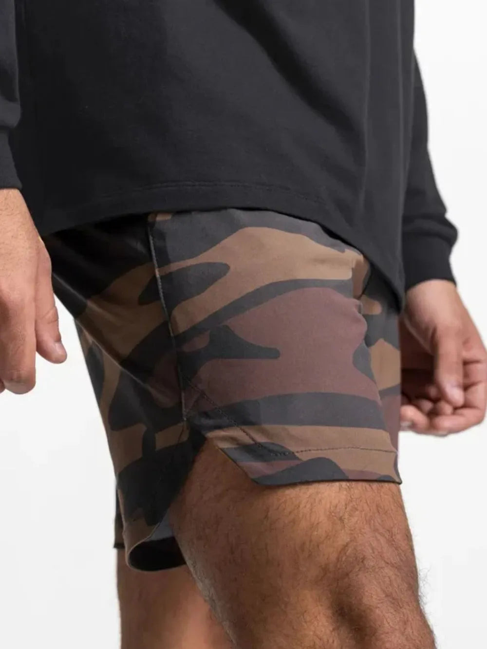 Men's elastic-waist active shorts with camouflage print and elastic waistband.
