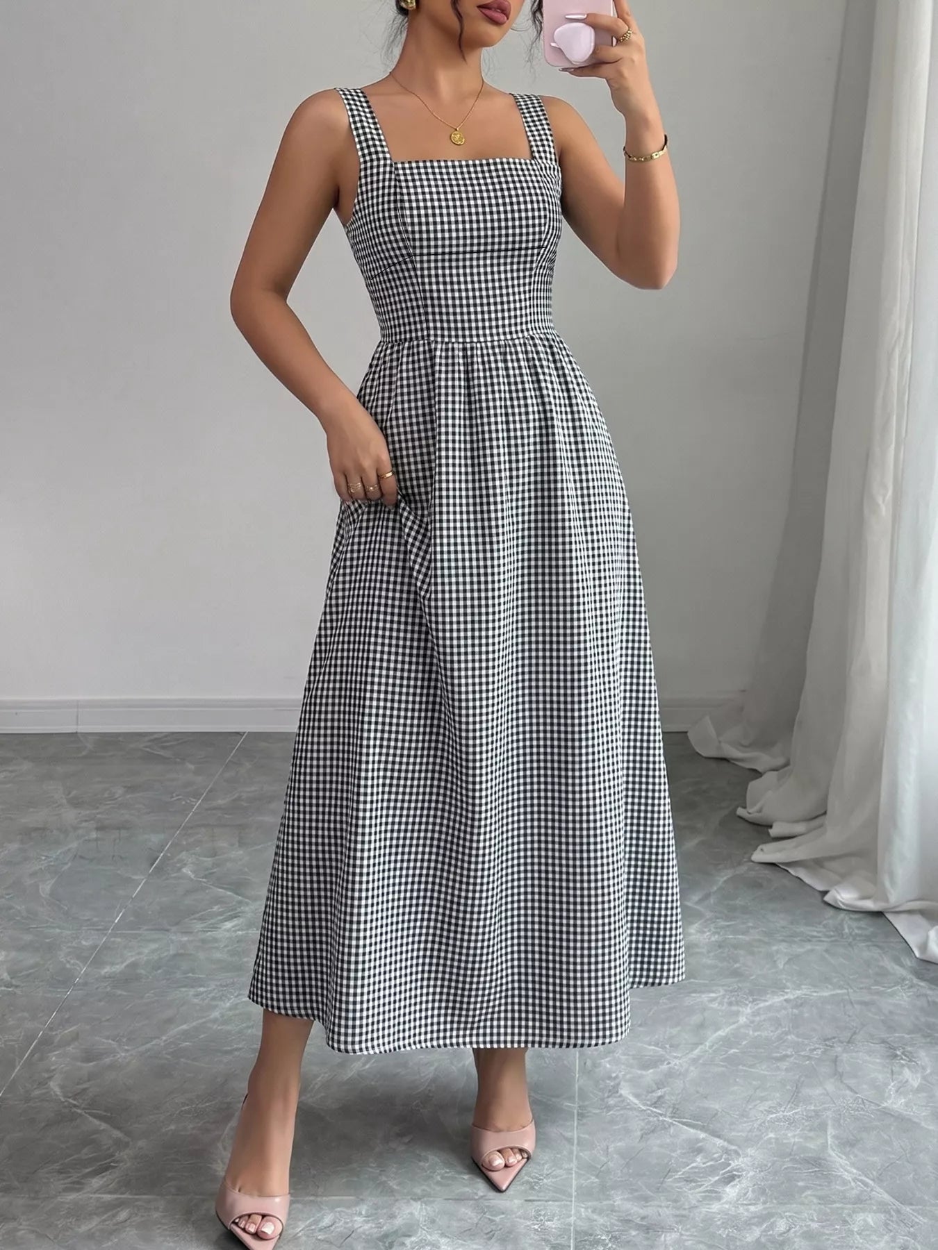 Black-and-white gingham square-neck sleeveless midi dress with gathered waist and full skirt