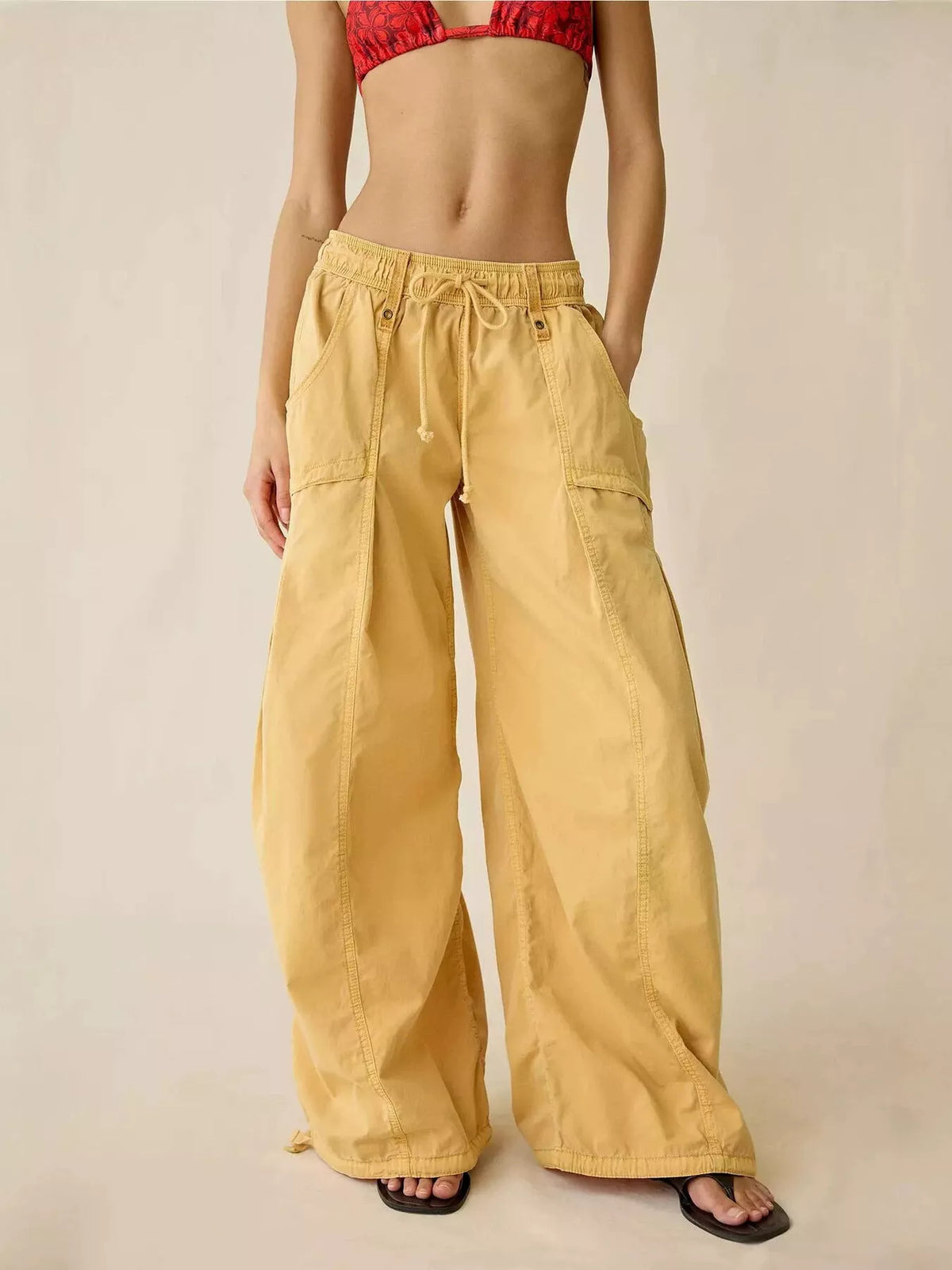 High-waisted cargo wide-leg pants, yellow, elastic waist with drawstring and cargo pockets