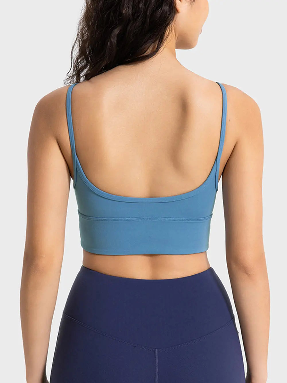Cerulean spaghetti strap sport bra with scoop-back styling