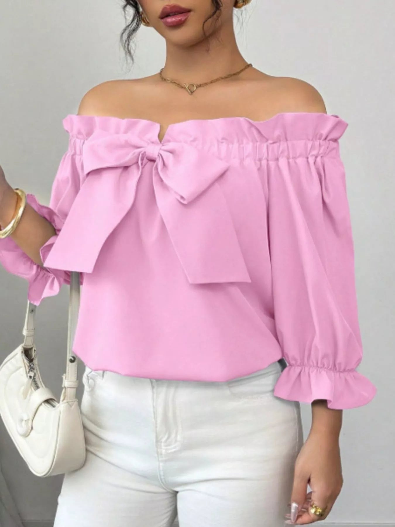 Bow Flounce Sleeve Blouse by Trendsi, pink off-shoulder top with a front bow and puff sleeves