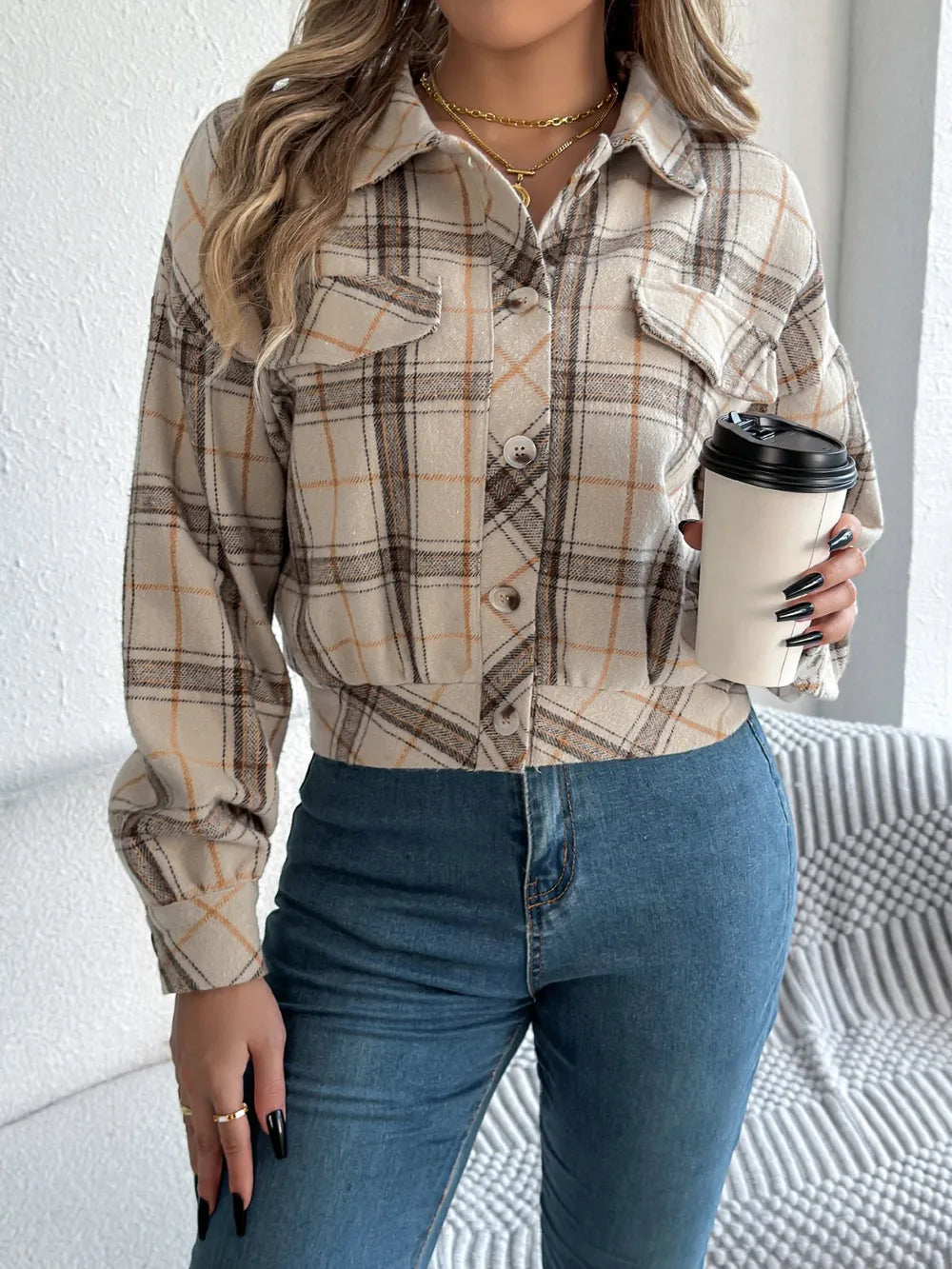 Plaid button-up long-sleeve jacket in beige plaid with dark-brown lines, flap chest pockets