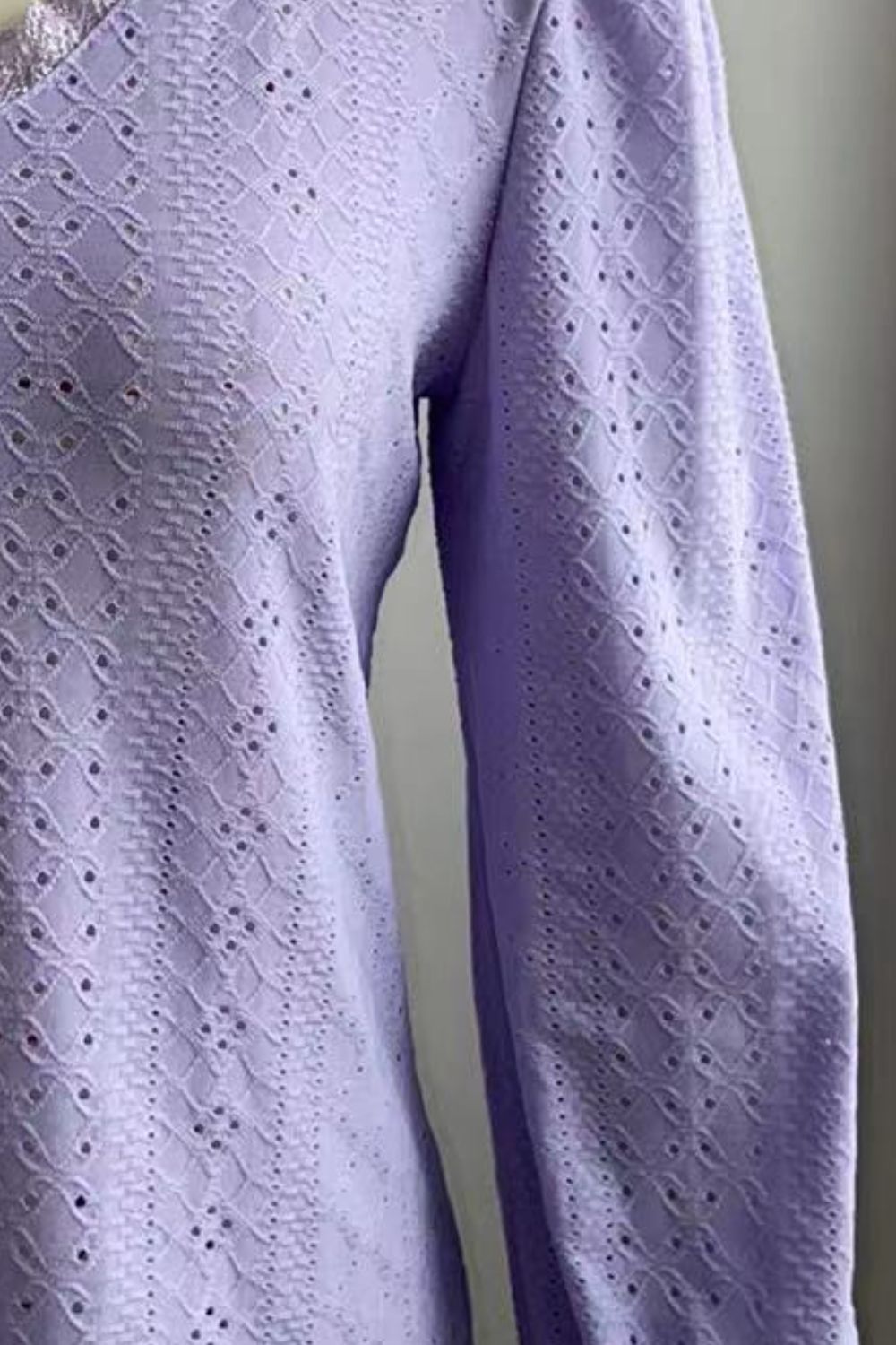 Lavender eyelet blouse fabric detail with dotted cutwork