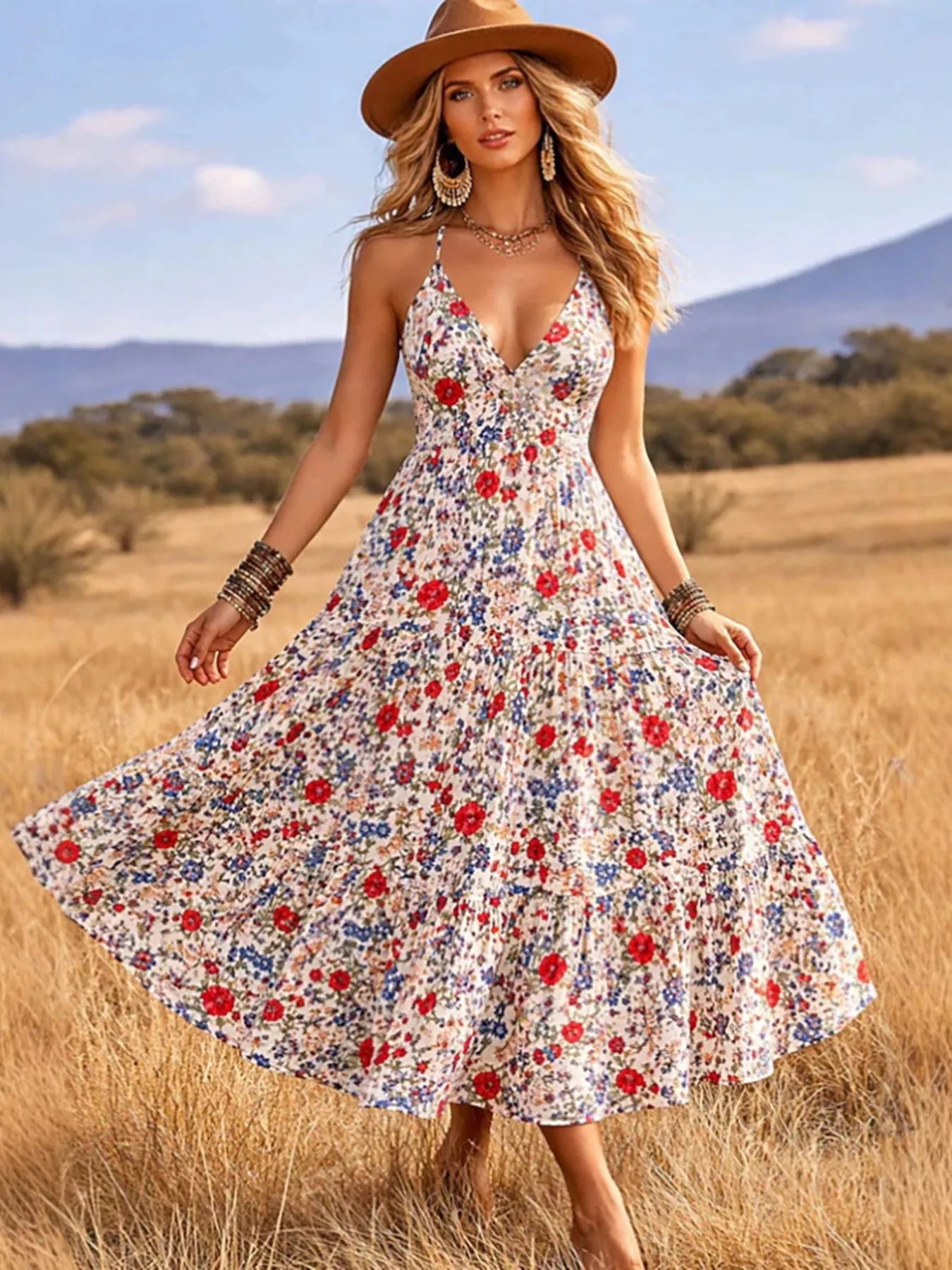 Floral print V-neck midi dress with sleeveless bodice and gathered, flared skirt.