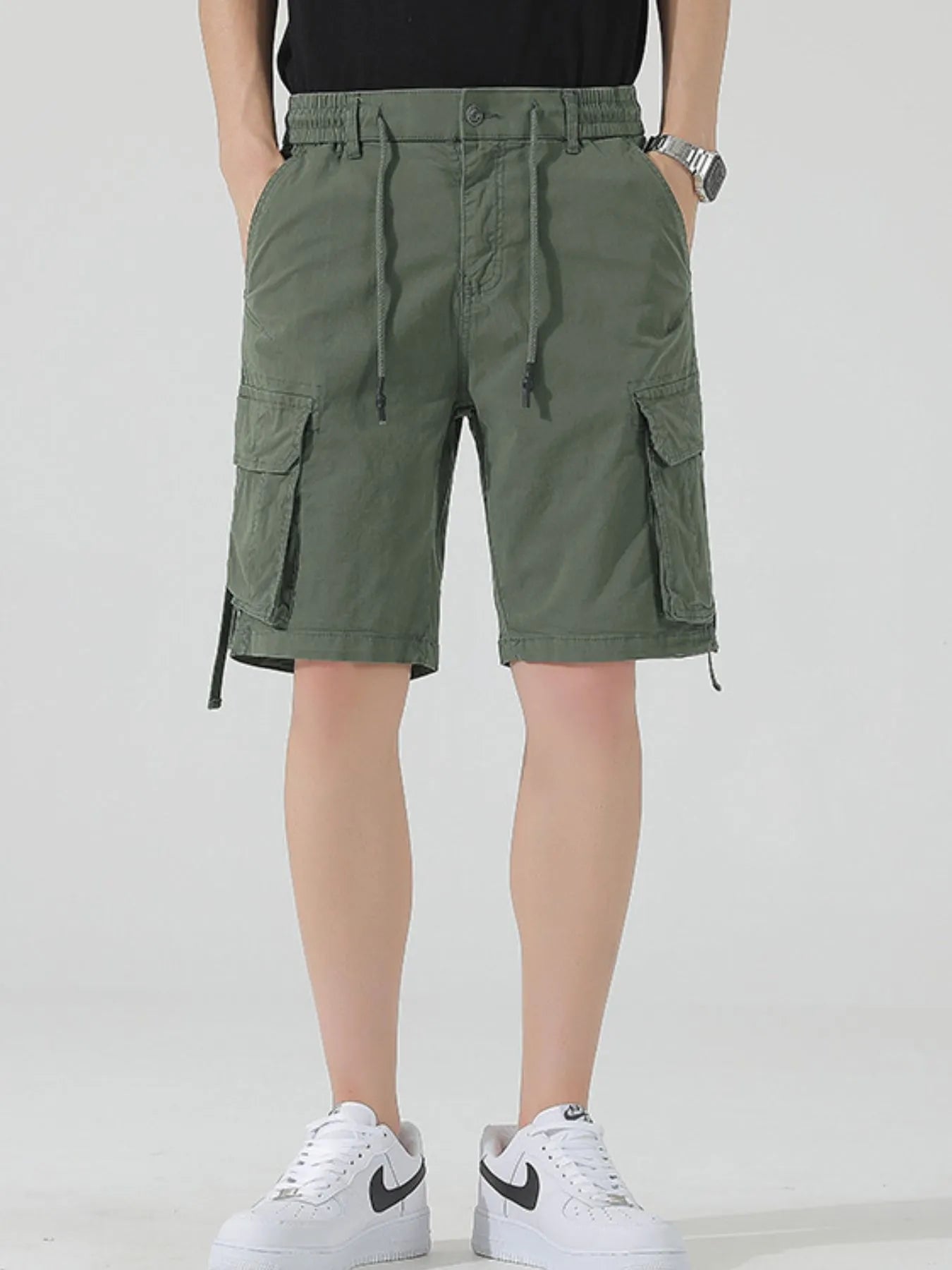 Men's army green drawstring cargo shorts with side flap cargo pockets