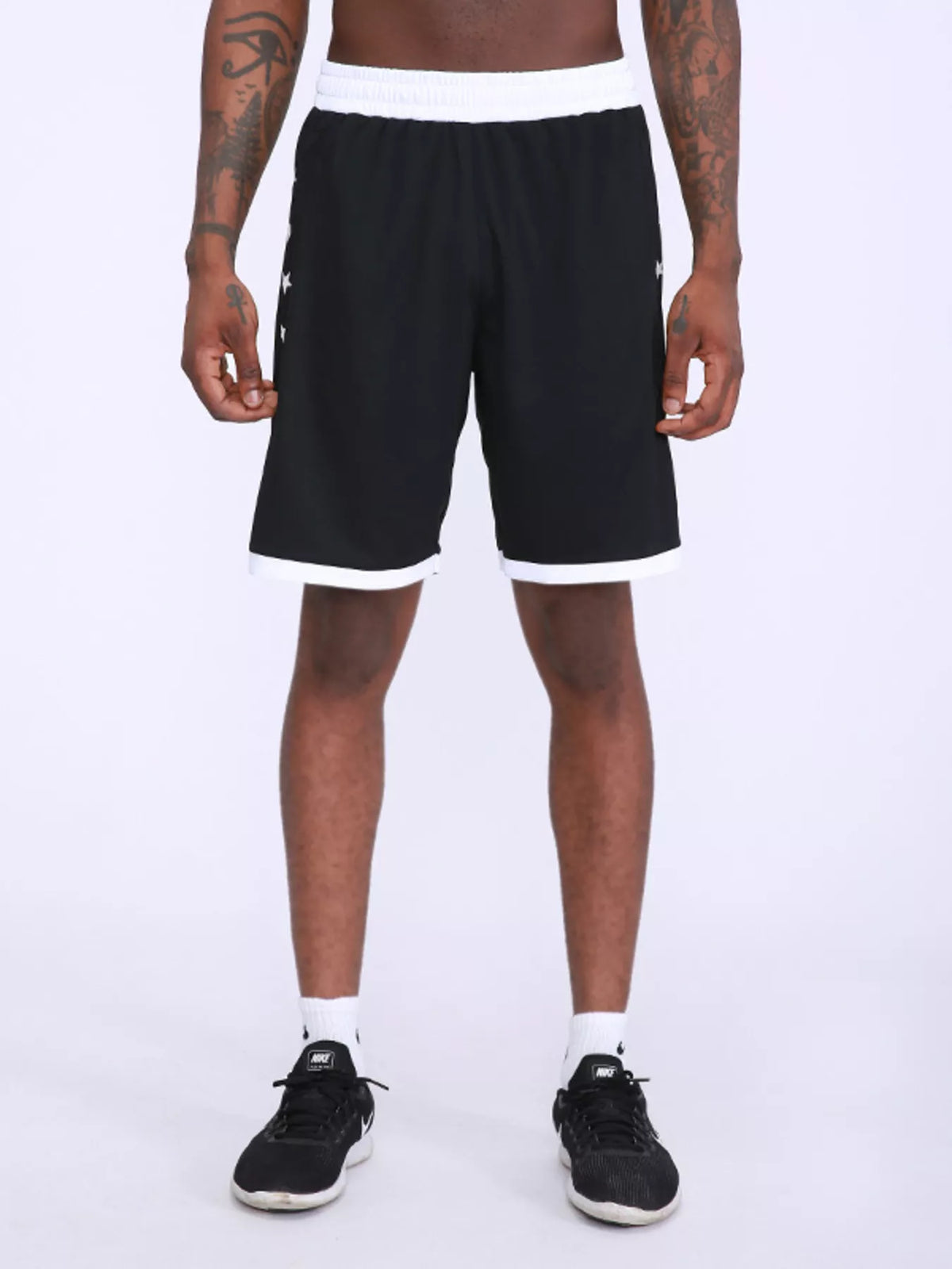 Men's black active shorts with white waistband and contrast hem trim