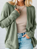 Sage eyelet knit cardigan with scalloped edge and batwing sleeves, textured knit.