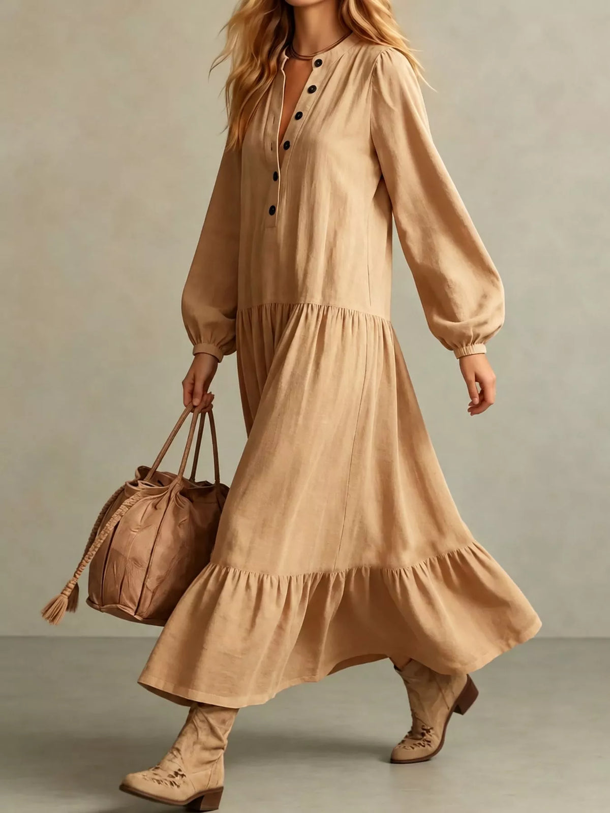 Light tan tiered maxi dress with button placket, long puff sleeves, and flared skirt