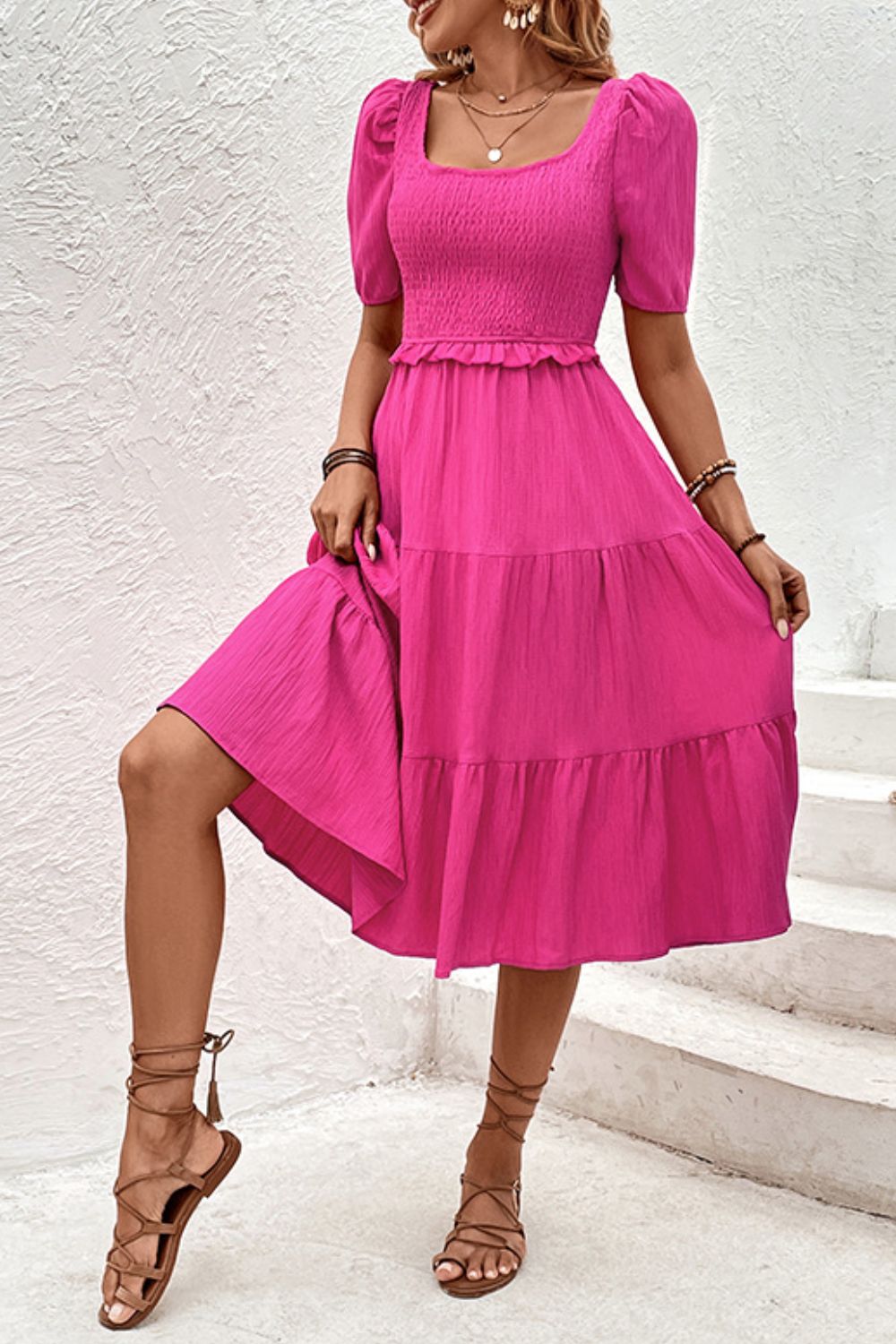 Hot pink puff sleeve tiered midi dress with square neckline, smocked waist