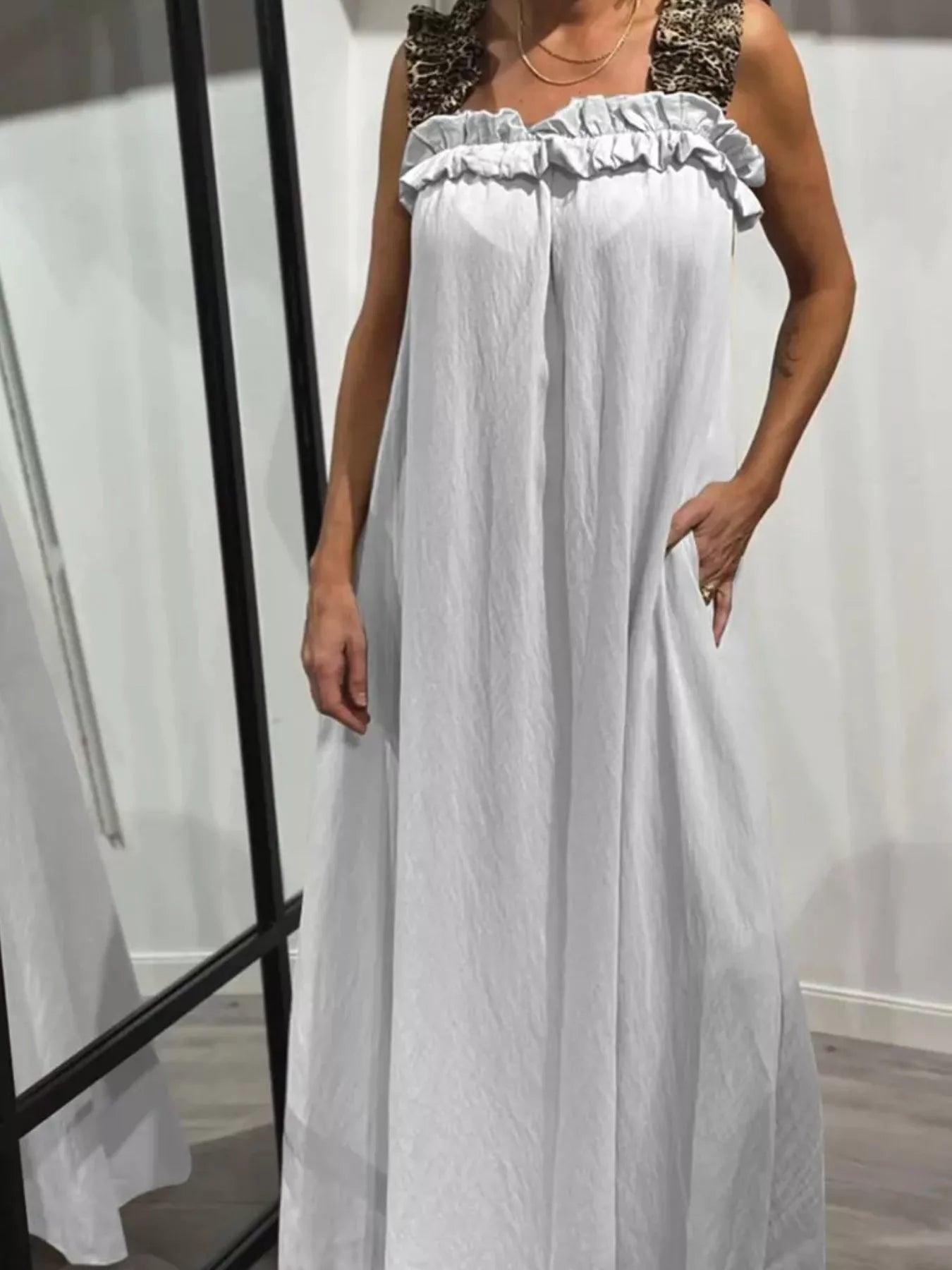 White plus-size maxi dress with ruffled straps and pockets