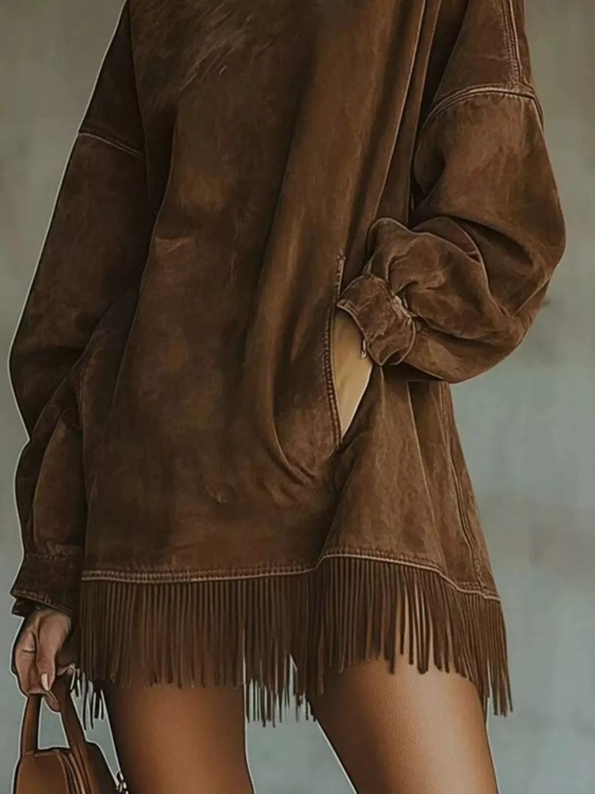 Dark brown mock neck mini dress with long sleeves, ruching cuff and fringe hem