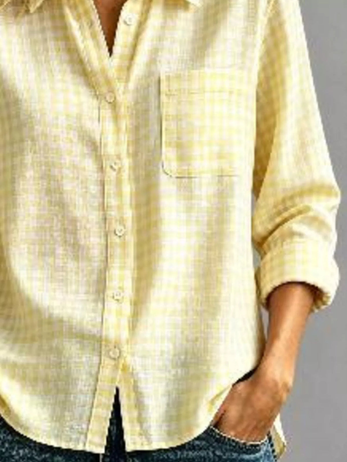 Light yellow gingham button-down shirt with chest pocket and long sleeves, button front.