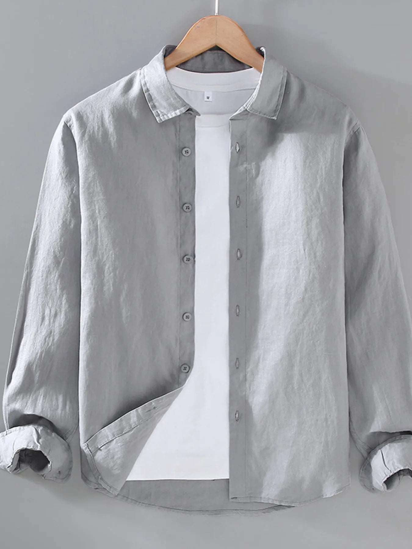 Gray button-up long sleeve shirt with button placket and spread collar