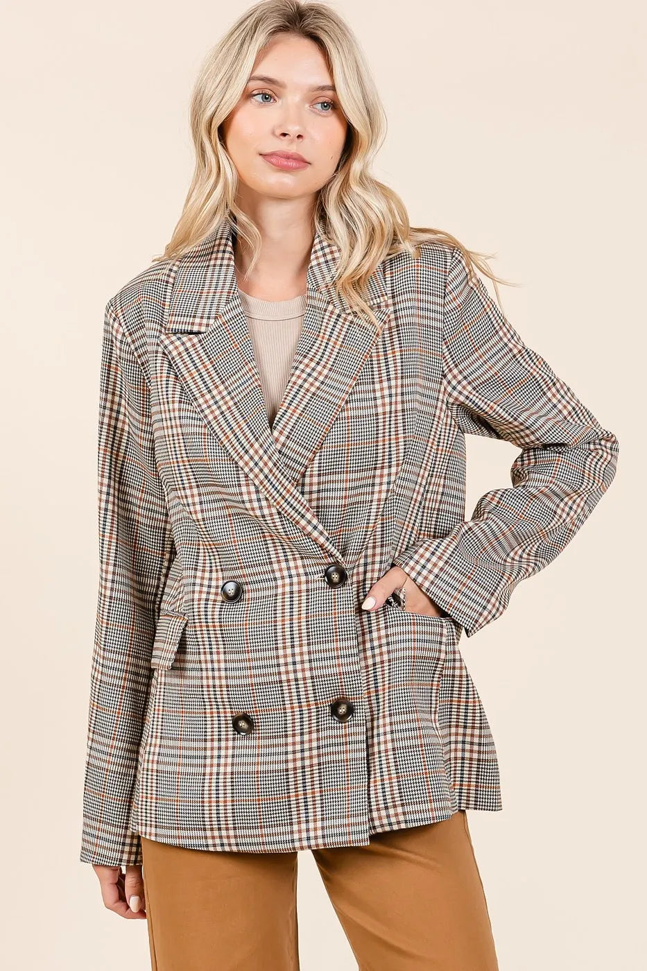 Brown plaid double-breasted blazer with notch lapel and dark button front