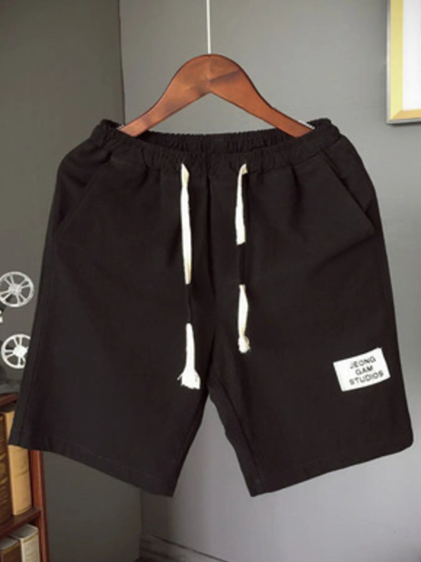 Men's plus size drawstring shorts, black with elastic waistband and drawstring