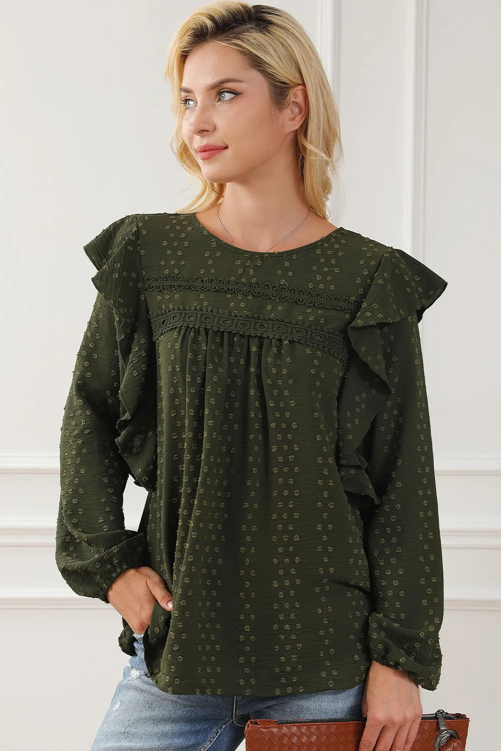 Ruffled round-neck blouse in dark olive green with ruffle shoulders and long sleeves