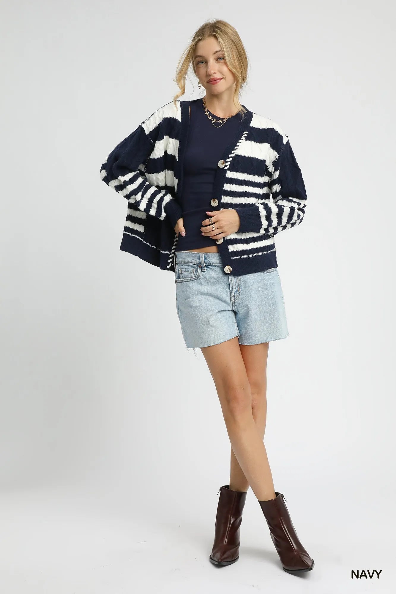 Navy striped button-up cardigan with large white bands and long sleeves