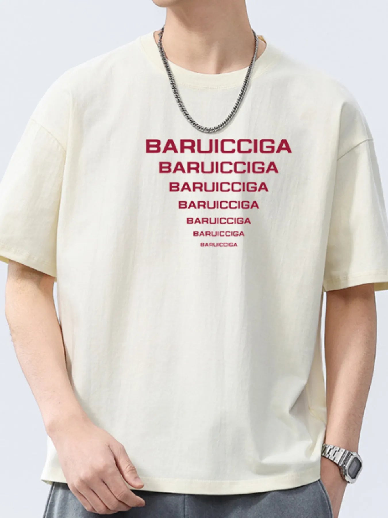 Off-white round-neck short-sleeve T-shirt with red logo text print.