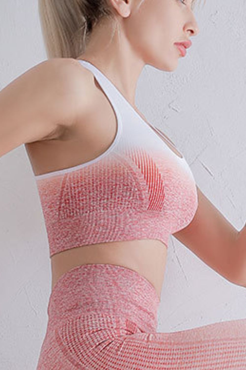 White and pink gradient racerback sports bra with textured knit and racer back